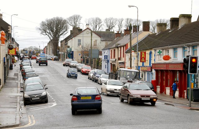A small town main street with shops and buildings.